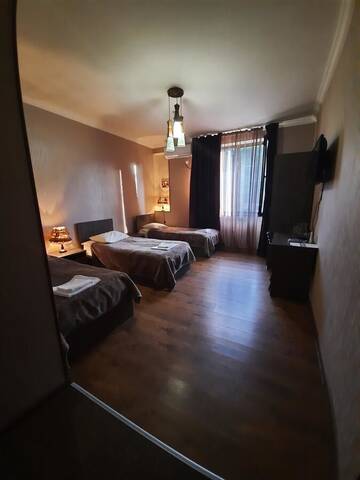 Фото номера Стандартный трехместный номер Отель Hotel Metekhara г. Амбролаури 3